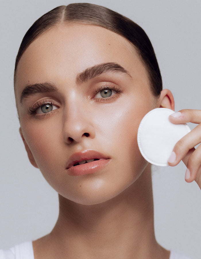 Model cleansing eye with cotton round